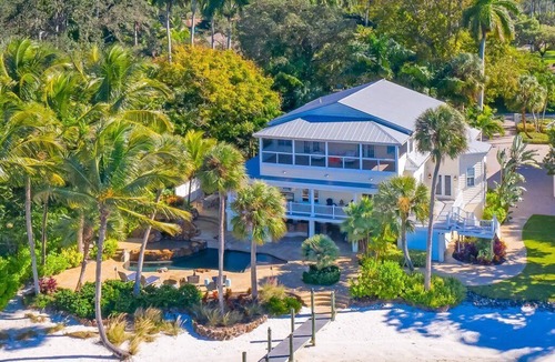 Fort Myers House | Historic Waterfront Home with 130' Private Beach, Dock, and Pool