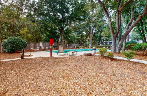 Folly Field House | Inviting getaway with shared pool - quick walk to beach and trolley