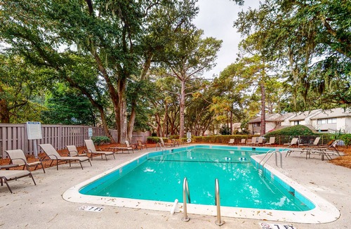 Folly Field House | Inviting getaway with shared pool - quick walk to beach and trolley