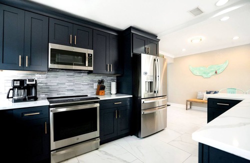 Indian Rocks Beach House | IRB Vice, golf cart, rooftop deck & heated pool