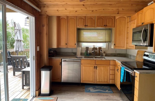 Placida House | Island Beach Barn - charming vacation house with bay/dock and beach access