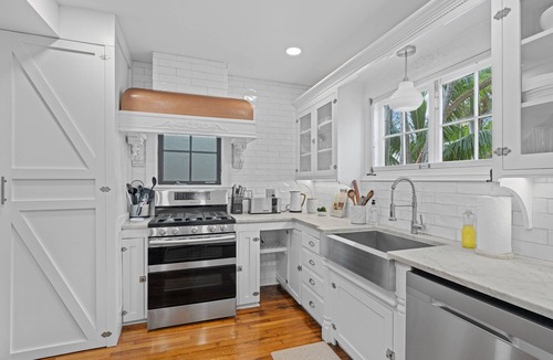 Sunshine Park House | July Special! Luxury and Historic Elegance in a Charming West Palm Beach Villa.