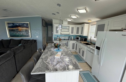 Cutthroat Harbor Estates House | KING's POINT Open Water views and a great resort for family and Fishing.