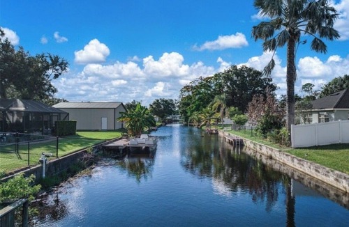 Sylvan Shores House | Lake Clay Canal Escape Porch Close to Downtown