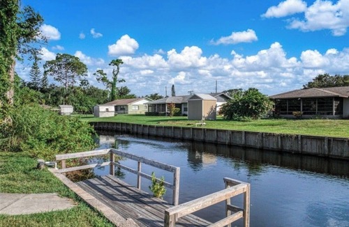 Sylvan Shores House | Lake Clay Canal Escape Porch Close to Downtown
