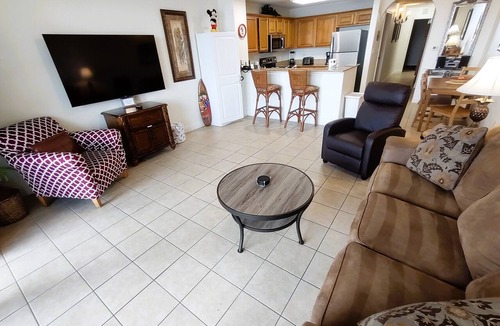 Florida Central Atlantic Coast Condo | Lakefront 885 sf CONDO just 1 mile to DISNEY with Balcony & 2 Resort POOLS & SPA