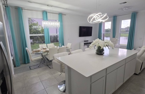 Greenacres House | Lakefront Furnished 3BR, 2-Car Garage