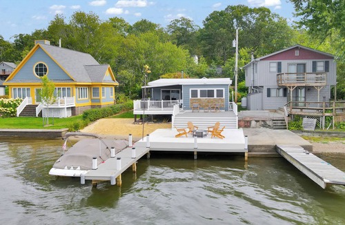 Hewitt House | Lakefront Haven Private Dock Private Beach Fire Pit Game Room