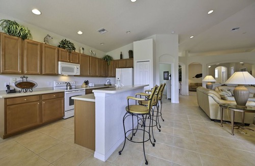 Bonita Springs Condo | Large Coach Home with lake view - Golf Available! - 5 Mins to Beaches!