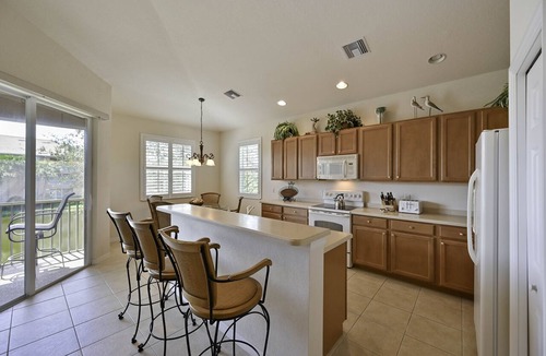 Bonita Springs Condo | Large Coach Home with lake view - Golf Available! - 5 Mins to Beaches!