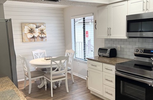 Trailer Estates Condo | Light and Airy Shorewalk Condo - modern coastal vibe with unique, open layout!
