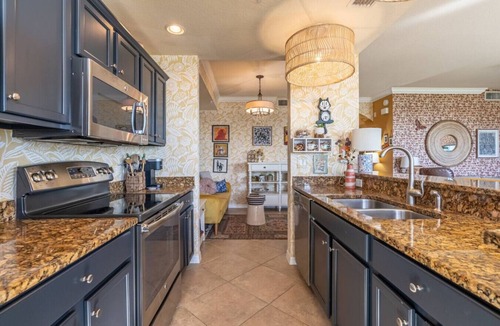 Naples Condo | Live in Paradise with Golf, Tennis, Gym, Pools + More!