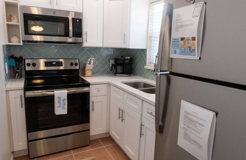 Ilexhurst Condo | LOCATION! Cabana just steps from the beach!