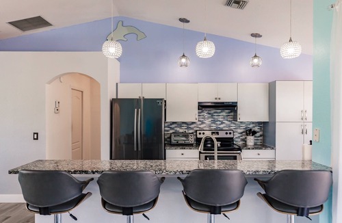 Fort Myers House | Lush Waterfront canal with stuning sunset views, Hot tub and heated pool!