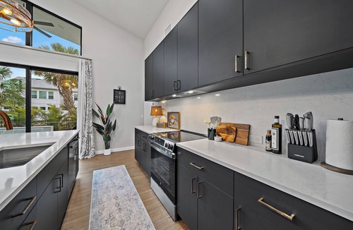 Downtown House | Lux Pelican's Perch | Heated Pool + Hot Tub + Gym