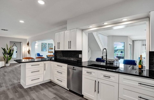 Deerfield Beach House | Luxury 5-bedrooms 4-bathrooms waterfront home heated pool, Tiki, Outdoor Kitchen