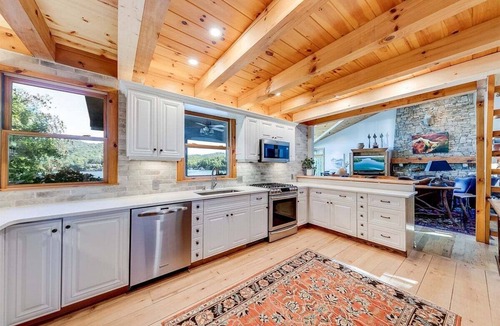 Clarkesville House | Luxury 5BR Lake Burton home with dock, game room, and lakeside views.