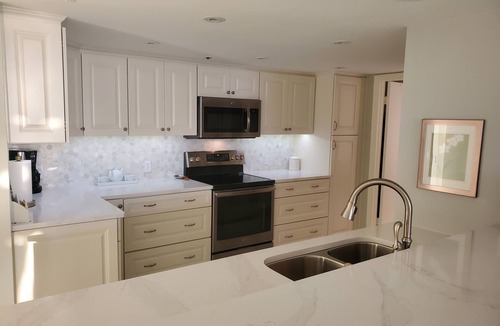 Isla del Sol Condo | LUXURY BAHIA POINTE WATERFRONT Condo/Panoramic Views! Dolphins, Manatee, More!