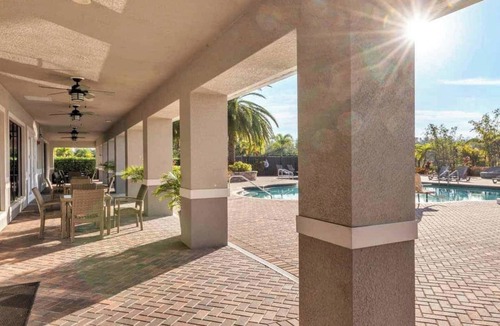 Fort Myers House | Luxury Fort Myers Resort Townhome - Heated Pool, Pickleball & Golf Cart Friendly