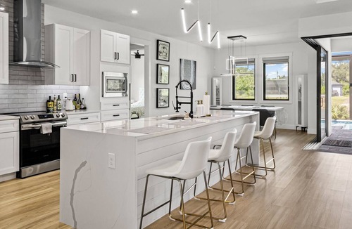 South Gulf Cove House | Luxury Relaxing Waterfront House - Heated Pool - 4BD - Family and Pets Friendly