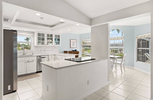 Caloosahatchee House | Luxury Waterfront Retreat: Heated Pool, Hot Tub, Direct Gulf Access & Game Room!