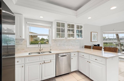 Caloosahatchee House | Luxury Waterfront Retreat: Heated Pool, Hot Tub, Direct Gulf Access & Game Room!