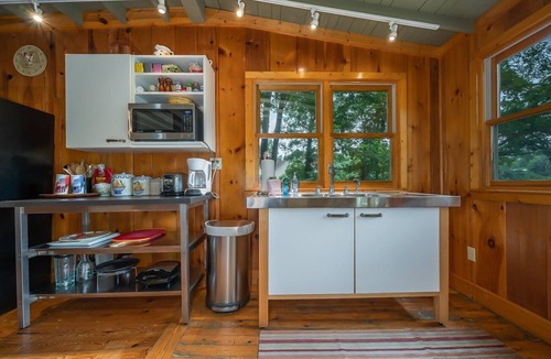 Sunset Cove House | Max's Blue Lakeside Cottage | Pet Friendly Lake Lure Cabin with Private Dock & Boathouse Deck