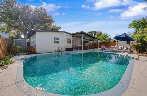 Town N County Park House | Mid-Century Tampa Retreat with Private Pool & Screened Lanai