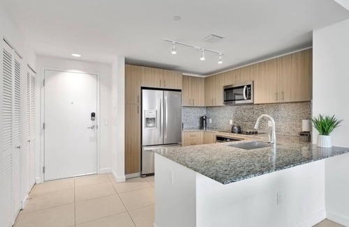 Doral Apartment | Modern 1BR Downtown Doral | Walk to Shops & Dining
