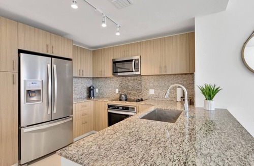 Doral Apartment | Modern 1BR Downtown Doral | Walk to Shops & Dining