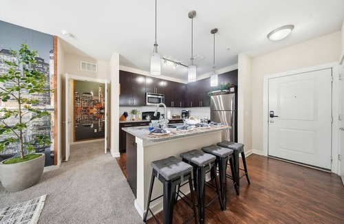 Courier City - Oscawana Apartment | Modern 2BR/2BA Tampa Retreat: Productivity Meets Comfort