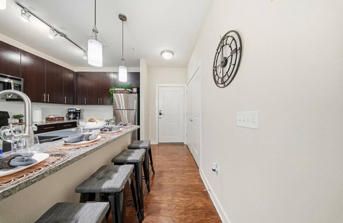 Courier City - Oscawana Apartment | Modern 2BR/2BA Tampa Retreat: Productivity Meets Comfort