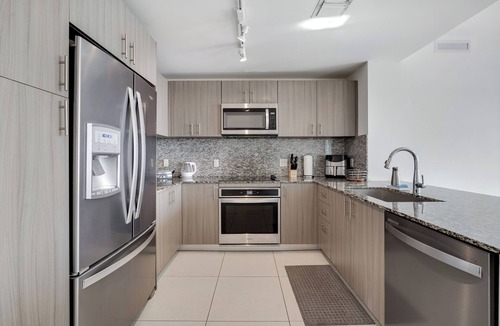 Doral Apartment | Modern 2BR Residence with open views & Balcony