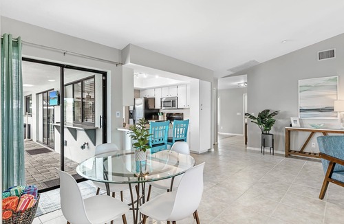 Cape Coral House | Modern Coastal Waterfront Retreat with Heated Pool & Dock