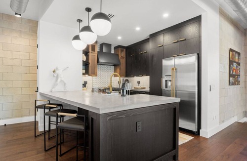 Hyde Park House | Modern & Luxurious Hyde Park Home, Steps to Hyde Park Village | The Strata Barn