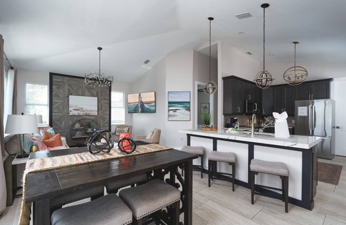 Mid Island House | New 4BR Oasis: Walk to Beach, Pool, Pet-Friendly!
