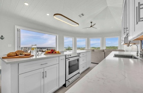 Captiva House | NEW! Beachfront! 3BR Suites Sustainable Home + Private Dock