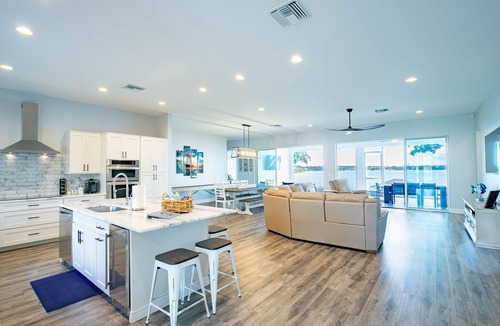 Lake Placid House | Newer Home on Lake June with Beach, Dock, Screened Patio and Hot Tub!