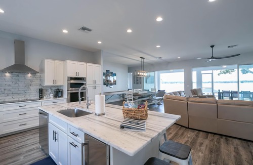 Lake Placid House | Newer Home on Lake June with Beach, Dock, Screened Patio and Hot Tub!