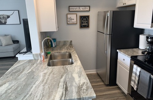 Holiday Isle House | Newly updated 1 bedroom 1 bathroom condo with gorgeous views of the golf course.