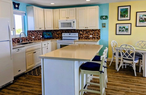 Tavernier Condo | Oceanfront Luxury Condo. Step on to the beach.