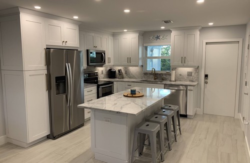 Rock Harbor House | Oceanside Key Largo Townhome, Private Marina, pools, Tennis and Golf Cart