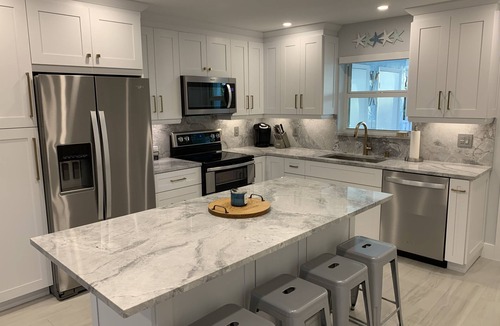 Rock Harbor House | Oceanside Key Largo Townhome, Private Marina, pools, Tennis and Golf Cart