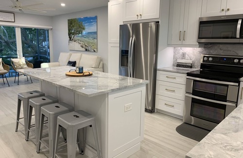 Rock Harbor House | Oceanside Key Largo Townhome, Private Marina, pools, Tennis and Golf Cart