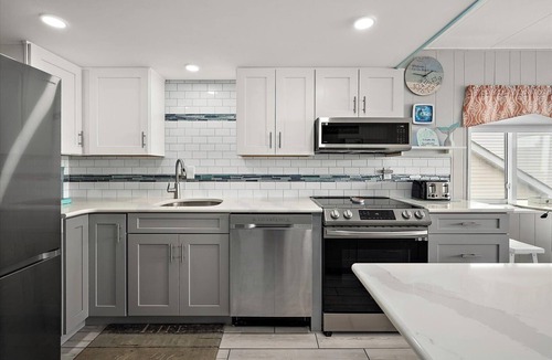 Ocean City Condo | On the Boardwalk, 1st floor end unit, Ocean front, 4th Street, Ocean City, MD