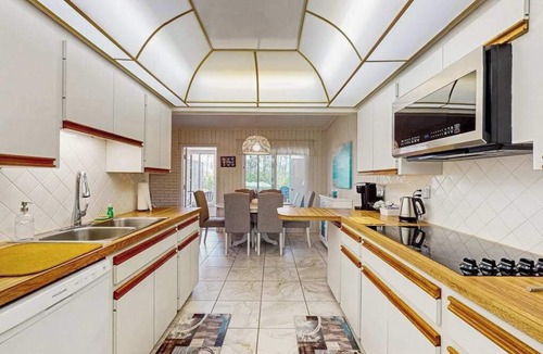 Englewood South House | Outdoor paradise on waterway with pool and spa, beach gear, and dog friendly