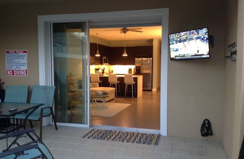 Four Corners House | Outstanding, owner operated Townhome, even a TV in the pool area!