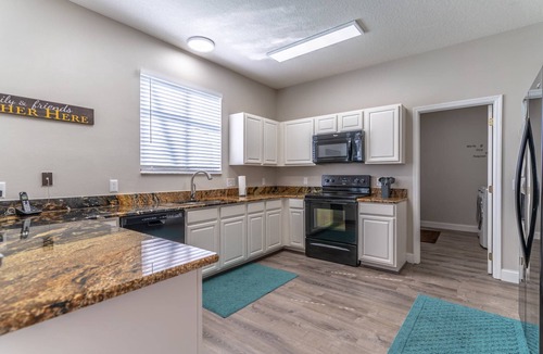Windwood Bay House | Oversized Lanai, Fenced Yard, Private Pool, Game Room | Pet Friendly & No Rear Neighbors | Sleeps 10