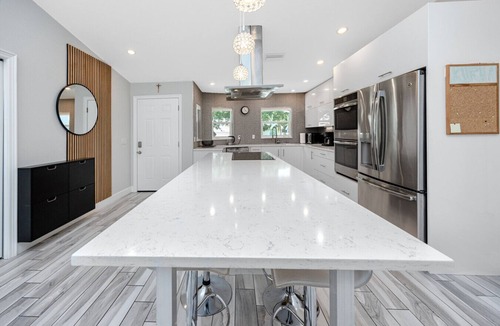 Palm Harbor House | Palm Harbor Hideaway | Gorgeous Home w/Heated Pool, Hot Tub & Tropical Oasis