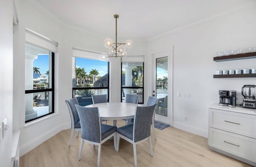 Pelican House | Paradise Palms Retreat - 5 BR (Sleeps 13) All New - Pool, Dock, Theatre + Games